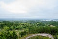 Sightseeing footbridge in woods of cloudy summer afternoon Royalty Free Stock Photo