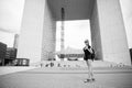 Sightseeing guide. Girl tourist sunglasses enjoy city center square. Woman stand in front of urban architecture. Must