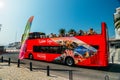 Sightseeing hop on and hop off double decker red tourist bus in Cascais, Portugal Royalty Free Stock Photo