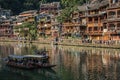 Sighseeing boats with tourists in Fenghuang