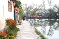 Rustic street along the lake in water village Hongcun, China Royalty Free Stock Photo