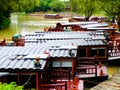 Sightseeing sculling boats lines up Royalty Free Stock Photo