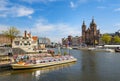 Sightseeng at Canal Boats near the Central Station of Amsterdam