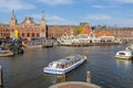 Sightseeng at Canal Boats next tot Central Station of Amsterdam