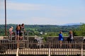 Sightseers standing near old stone walls, looking over battlefields,Fort Ticonderoga,New York,2015