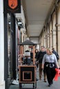 Sightseers walking past many shops, Paris,France,2016