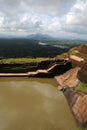 Sigiriya is an ancient mountain fortress destroyed the remnants of the Palace, located in the Central Matale.Ruins of fortress on Royalty Free Stock Photo