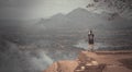 Unsprcific woman is looking at the top of Sigiriya Rock fortress, Sri Lanka Royalty Free Stock Photo