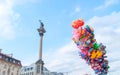 Sigismund column and and many colorful balloons in Warsaw.