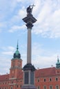 Sigismund`s Column with the Royal Castle in the background, Warsaw, Poland. Royalty Free Stock Photo
