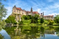 Sigmaringen Castle rising above Danube river, Germany