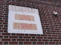 Sign on abandoned closed lunch Dinner