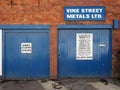 sign above the entrance to vine street scrap metal dealers in scarborough