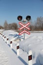 Sign adjustable railway crossing equipped with a semaphore, signal columns Royalty Free Stock Photo