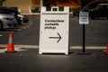 Sign advertising Contactless Curbside Pickup at retail retail store parking lot Royalty Free Stock Photo