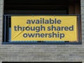 Sign advertising new apartments available through shared ownership Royalty Free Stock Photo