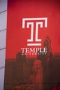 Sign advertising Temple University as seen on the side of a building in center city Philadelphia