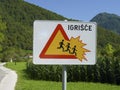 Sign attention children crossing Igrisce at a warning sign in slovenia