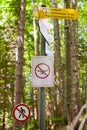 A sign on the ban on flying quadrocopters hangs in forest