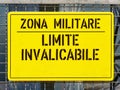 Sign ban outside the military area with the italian text translation: Military zone insurmountable limit