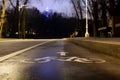 Sign bicycle path. At night in the park. this way to your health. Headlights shine towards. Headlights shine towards. Sports lifes Royalty Free Stock Photo