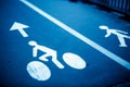 Sign for bikers and pedestrians on blue Royalty Free Stock Photo