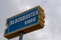 Sign for Blockbuster Video movie rental store. Close up view, overcast day