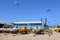 The sign on a blue bus marks the spot of the Bonaire kiteboarding school.