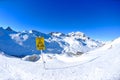 Sign board at High mountains under snow Royalty Free Stock Photo