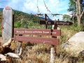 Sign board showing way to Chimi Lhakhang, Bhutan Royalty Free Stock Photo