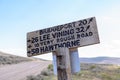 Sign from the Bodie Ghost Town road, giving drivers directions to local towns of Lee Vining, Hawthorne and Bridgeport California Royalty Free Stock Photo