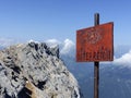 Sign of border crossing at Zugspitze mountain, Bavaria, Germany