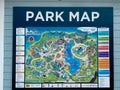 A sign on a building wall that is the park map of Seaworld in Orlando, Florida Royalty Free Stock Photo