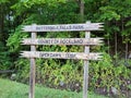 Sign for Buttermilk Falls Park, County of Rockland, Open Dawn - Dusk against dark woods