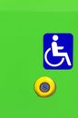 Sign and button on bus for handicapped people Royalty Free Stock Photo