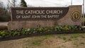 Sign for The Catholic Church of Saint John the Baptist in Edmond, Oklahoma.
