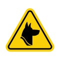 Sign Caution dog. Dangerous guard dog. Yellow triangle sign with a dog icon inside. Warning sign angry dog. Sign danger dog