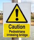 Sign - Caution Pedestrians Crossing Bridge Royalty Free Stock Photo