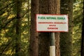 A sign in Ceahlau National Park that says: `Abandonment of waste brings bad luck`