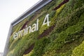 Sign of Changi Airport Terminal 4 at the enterance in Singapore Royalty Free Stock Photo