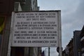 Sign at Checkpoint Charlie in Russian French English and German in Berlin Germany