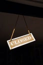 Sign closed behind the window of a shop door Royalty Free Stock Photo
