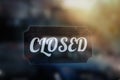 The sign closed on the door of a street cafe, behind glass Royalty Free Stock Photo