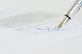 Sign a contract or agreement with a pen Royalty Free Stock Photo