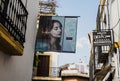 Sign advertises a taverna and wine shop in Cordoba, Spain