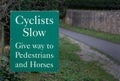 Sign - Cyclists Slow - Give Way to Pedestrians and Horses
