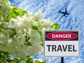 The Sign danger travel blooming Apple tree and taking off the plane.