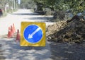 Sign of detour travel. Pit on the road. repair work. Royalty Free Stock Photo