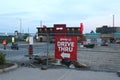 A sign directing drivers to the Wendy`s fast food drive through. Wendy`s is a leader in the fast food industry