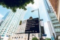 Sign Direction on 5th Street in the downtown city of Los Angeles, California. Low angle view